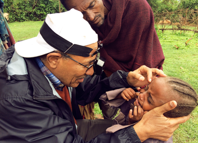 dr. wondu alemayehu examining a little girl